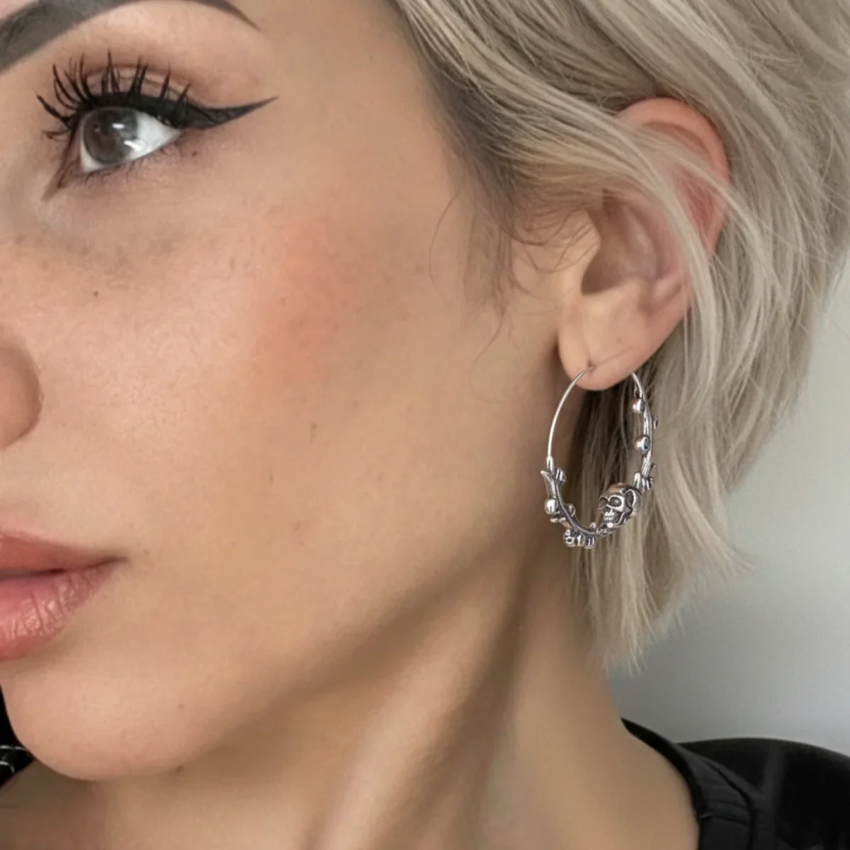 Steel Skulls on Branch Hoop Earrings - Image 2